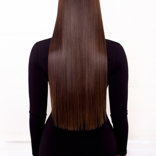 rear photo of woman with 28 inch long hair. silky straight