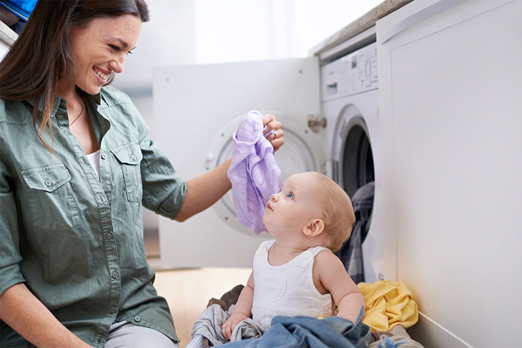 mum and child doing laundry