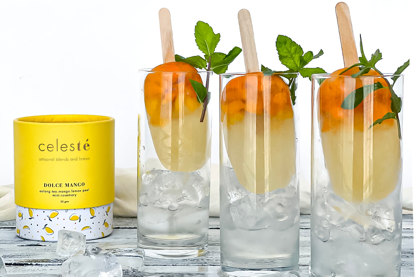 Popsicle Recipe, made with Celes-te Dolche Mango Oolong Tea blend in fine teaware with lot of ice to relish this summer