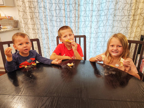 Image of children eating Angel's wings dessert