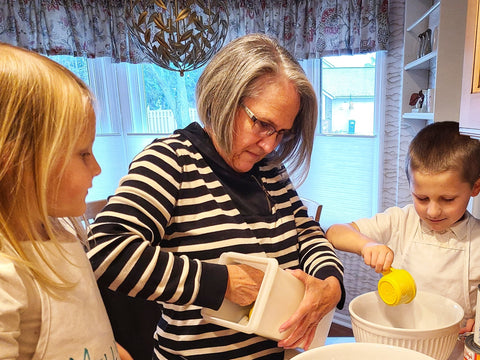 Grandmother and Grandchildren baking