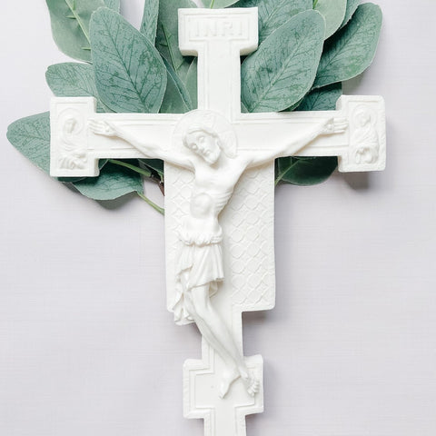White wall crucifix display