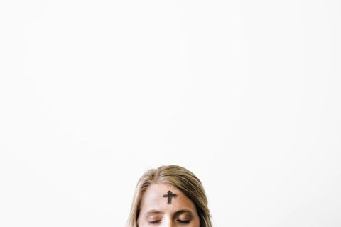  Woman with a cross on her forehead