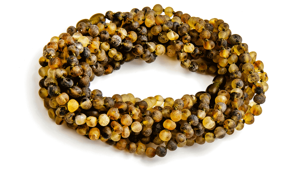 A Bundle of Raw Baltic Amber Teething Necklaces for Babies in Green Color