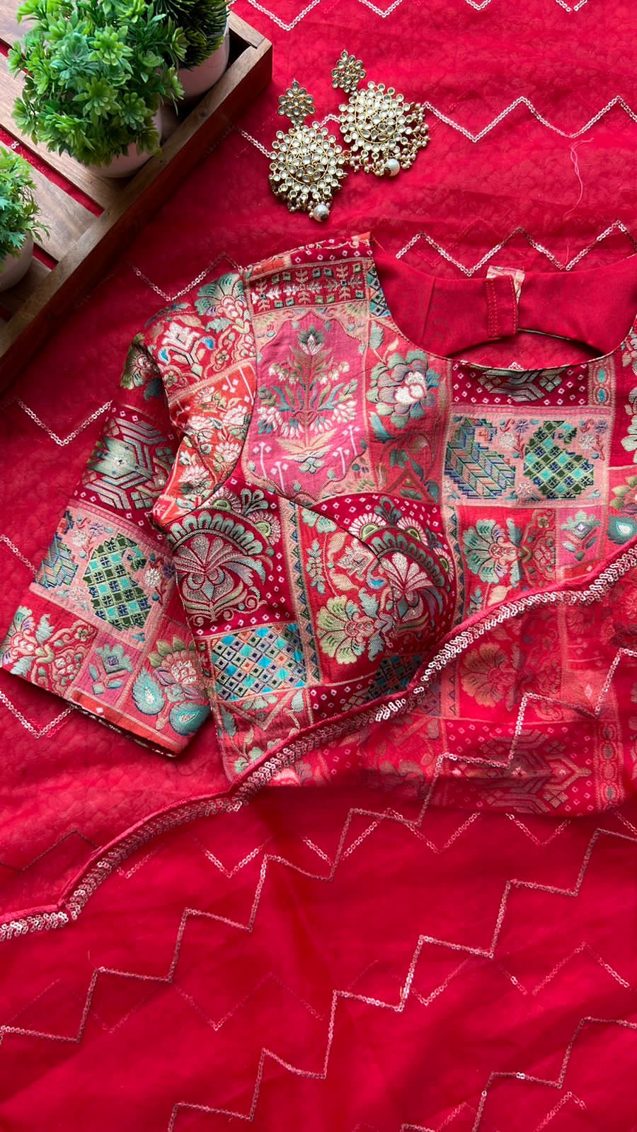 Red organza saree with banarasi work blouse