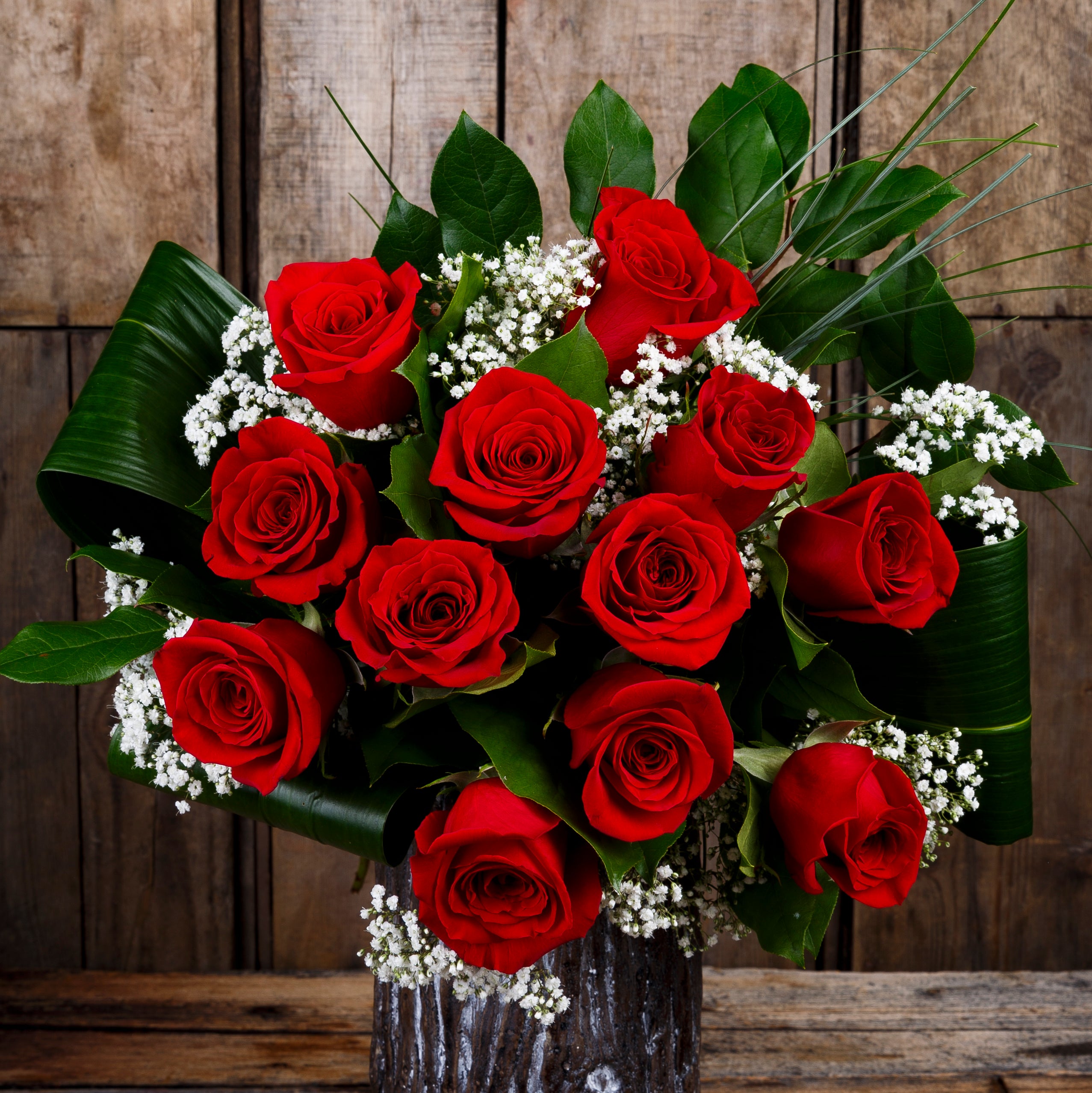 bouquet of red roses in vase