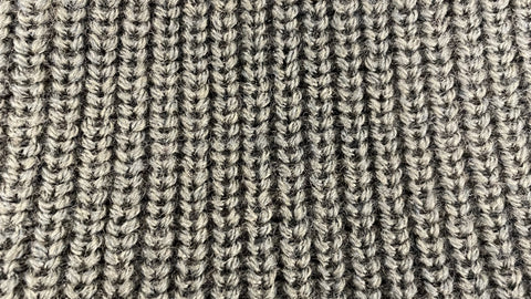 ribbed knit merino wool beanie zoomed in image 100% merino wool can stretch is soft