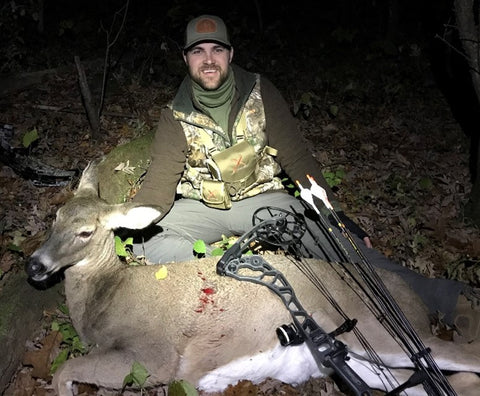 Hunter with a prize deer from his hunt
