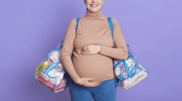 pregnant woman with hospital bags