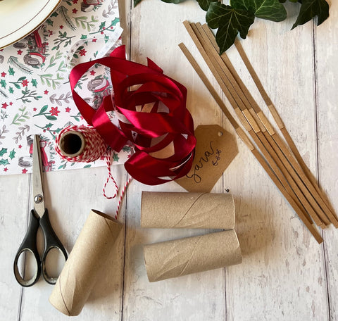 Ribbon, scissors, wrapping paper 