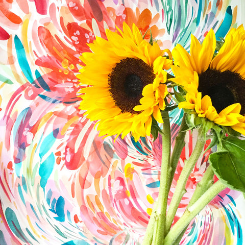 Sunflowers with a watercolour painting behind by CreativeIngrid | Ingrid Sanchez.