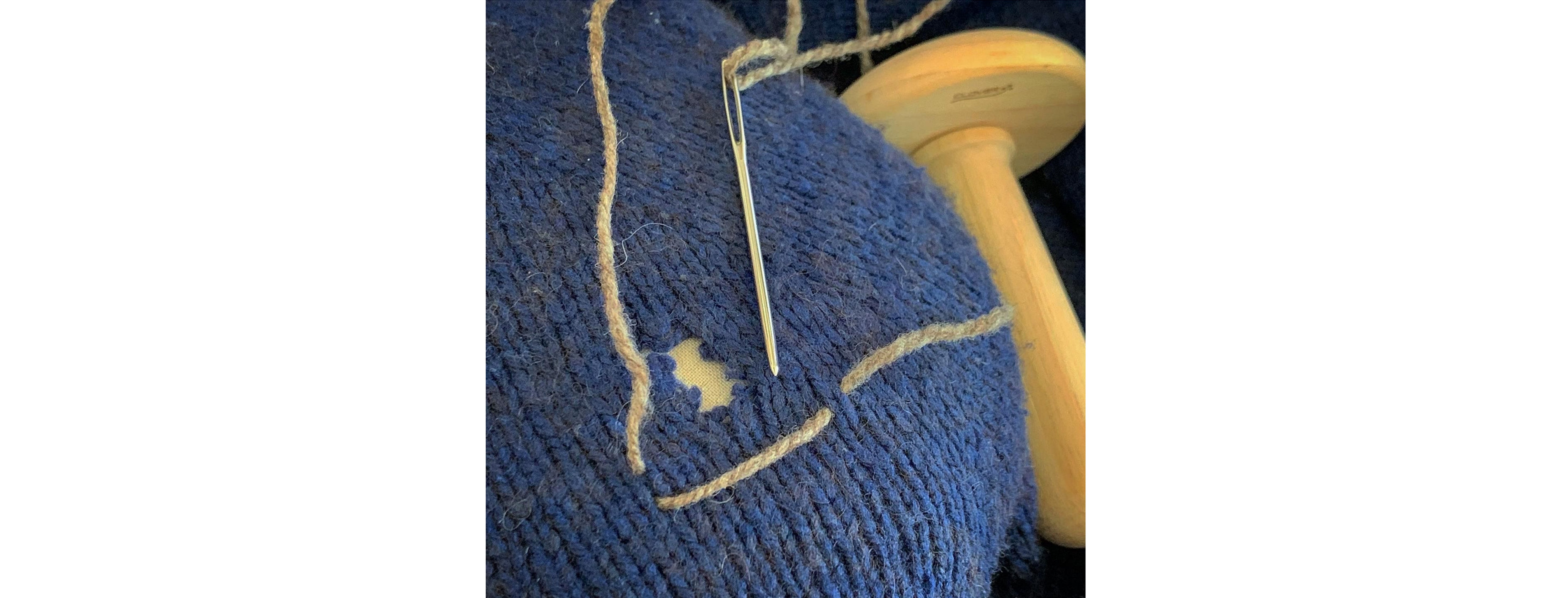 Stretch the damaged area of your knitwear on a smooth surface