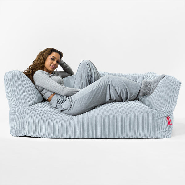 The 2 Seater Albert Sofa Bean Bag - Cord Baby Blue with model