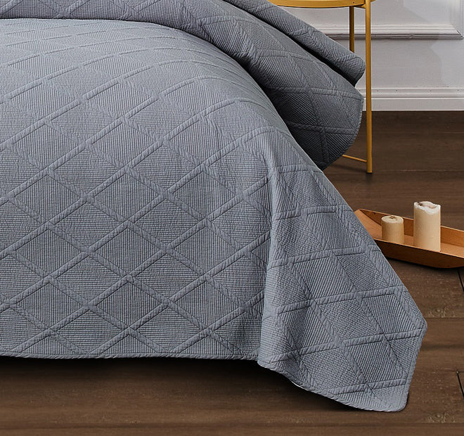 grey bed coverlet