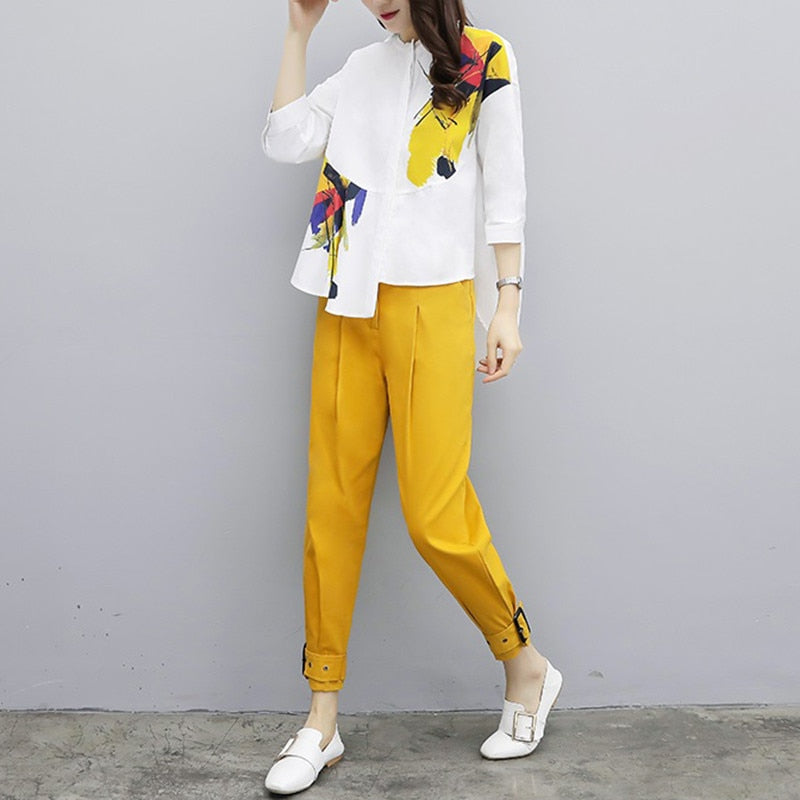 white top yellow pants