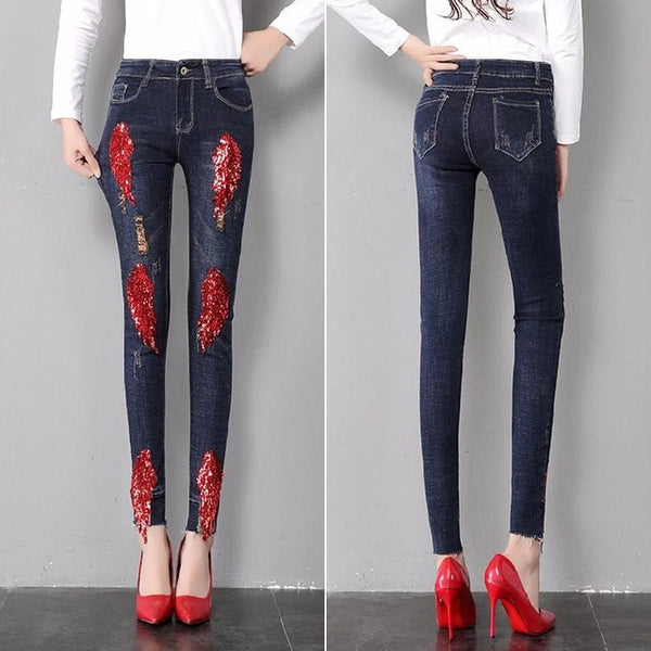 red ripped jeans womens