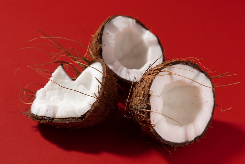 Split open coconuts to use a lube alternative