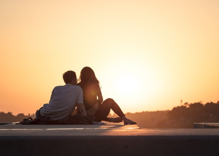 Couple Getting Romantic Outdoors