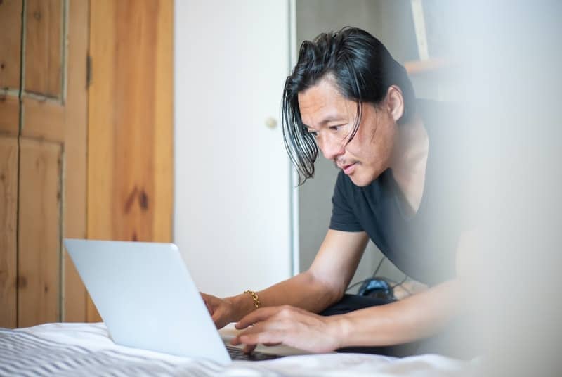 man researching if too much porn causes less erections
