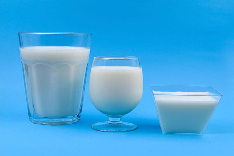 Glasses of milk representing prostate milk