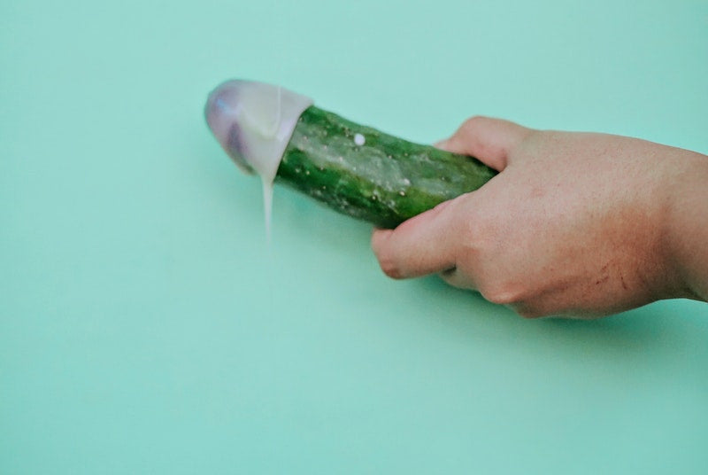 Pickle with cream on the tip to represent finishing masturbation