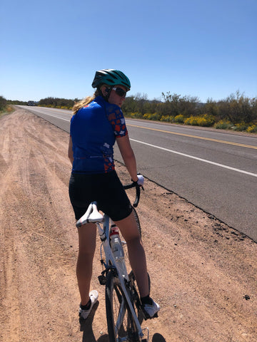 Ali Jones stops her bike roadside