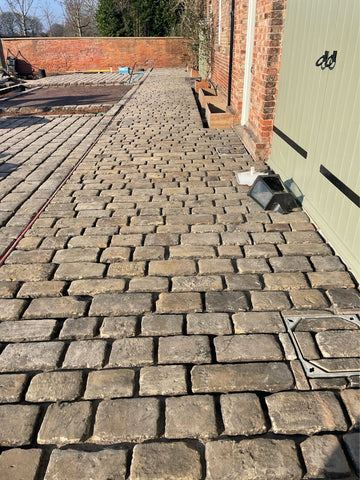 Reclaimed Grit Stone ''loaf'' Cobbles how to lay court yard