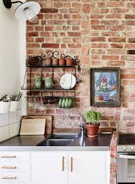 brick featured kitchen wall