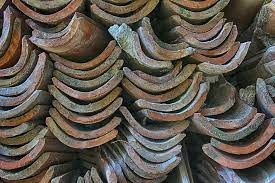 Reclaimed roof slabs piled together