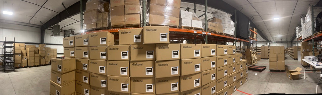 Wide photo of packed Dialtune drums in our warehouse