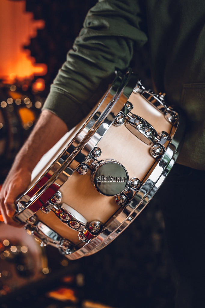 Holding Dialtune snare drum