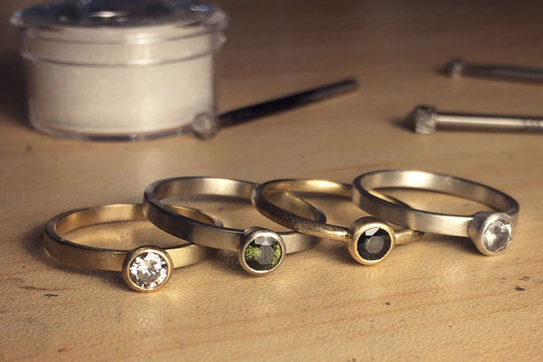 image of 4 bezel set rings