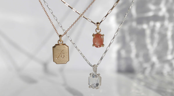 image of necklaces from the Aide-mémoire Charm Bar
