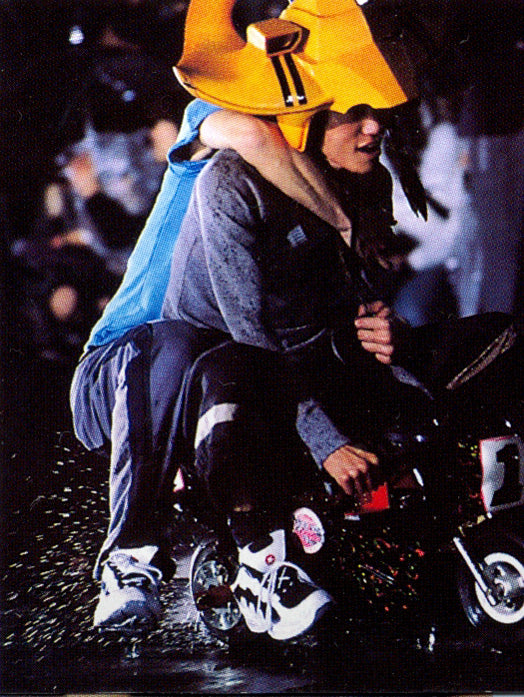 20471120 models riding pocket bikes on the runway of the YIKES collection SS/98 Spring Summer 1998 Tokyo