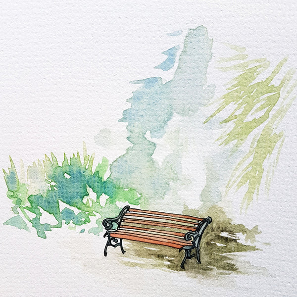 Watercolour sketch of a wooden bench in a garden