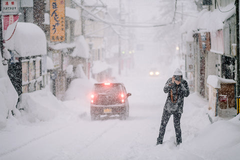 Adventure Photographer in Japanese Snow Storm