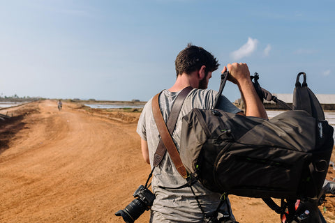 Male Adventure Photographer with Leather Camera Straps