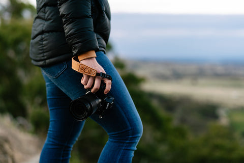 Female Photographer with Leather Wrist Strap