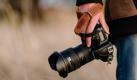 Photographers Hand with Leather Wrist Strap