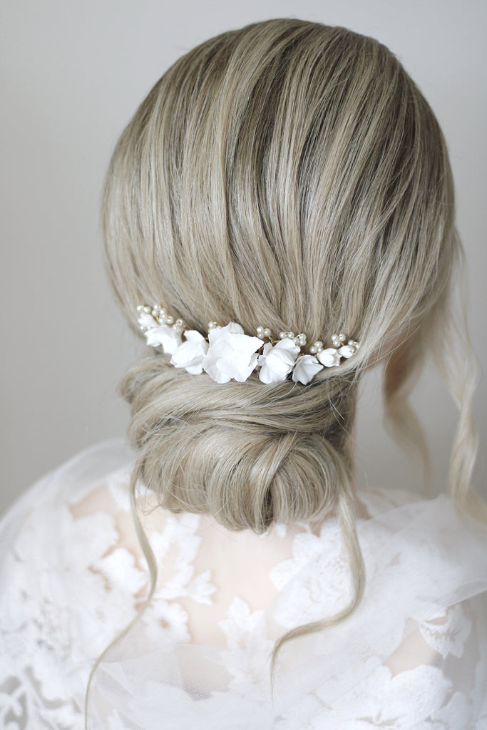 bridal accessories worn in a bridal upstyle