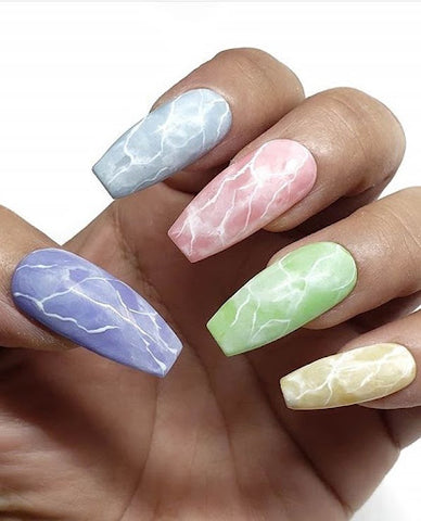 Marble nails with pastel shades and white marble