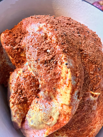 Prepared pork in the casserole dish before it is cooked