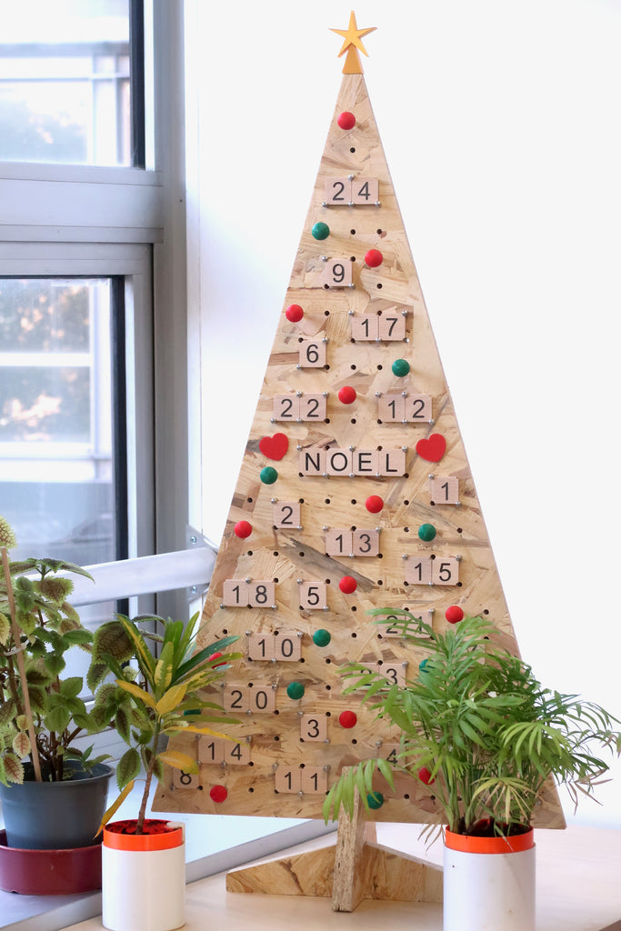 The large ecological wooden Christmas tree