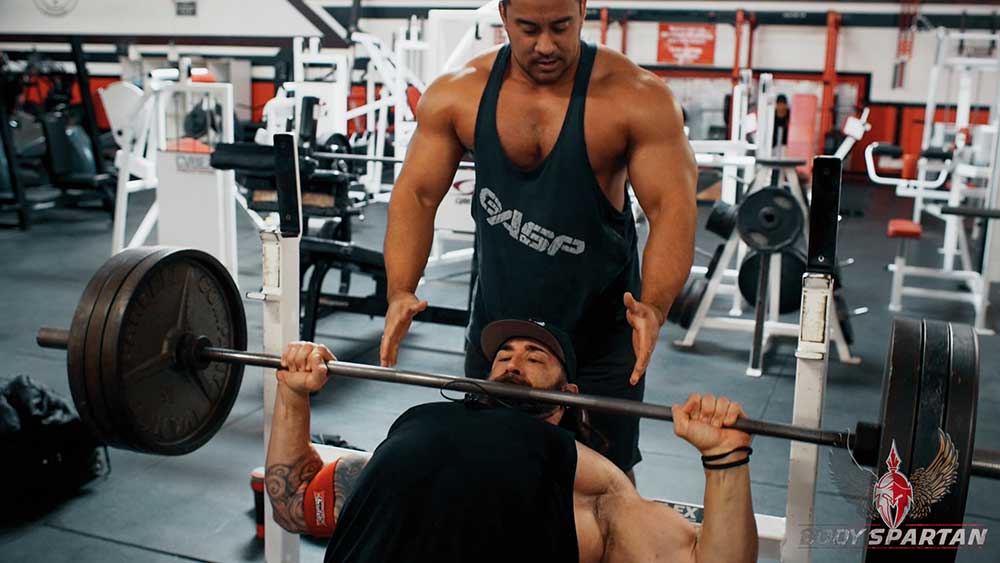 Chest workout using incline barbell press, lowered
