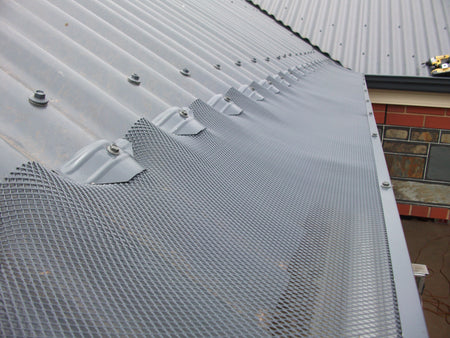 Gutter Guard Installed on a corrugated roof