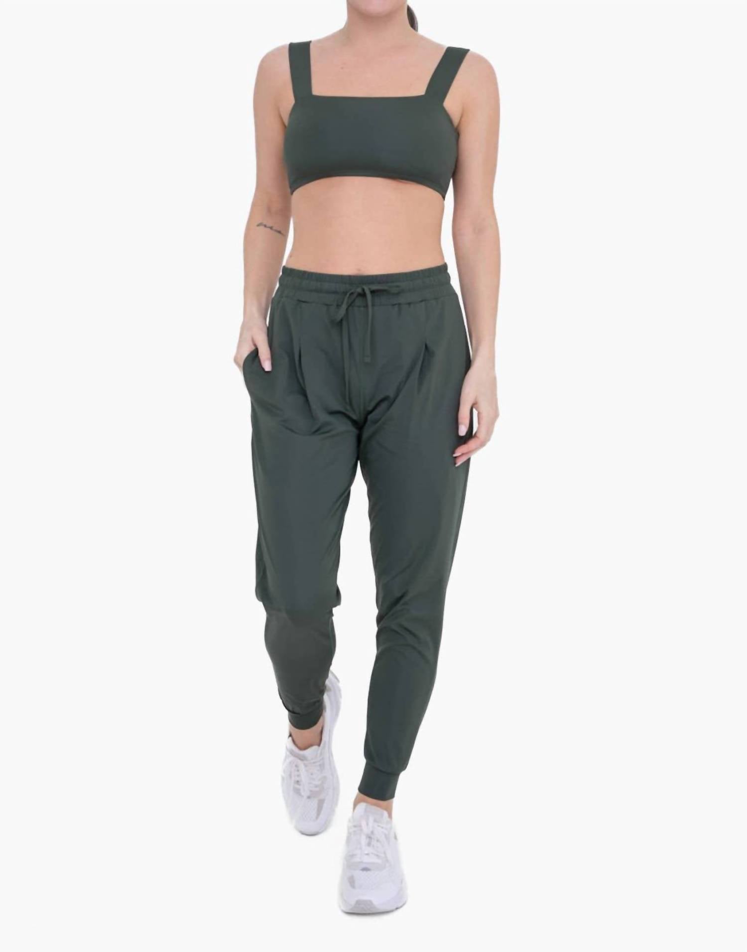 Mono B Solid Pleated Front Joggers In Deep Forest In Green
