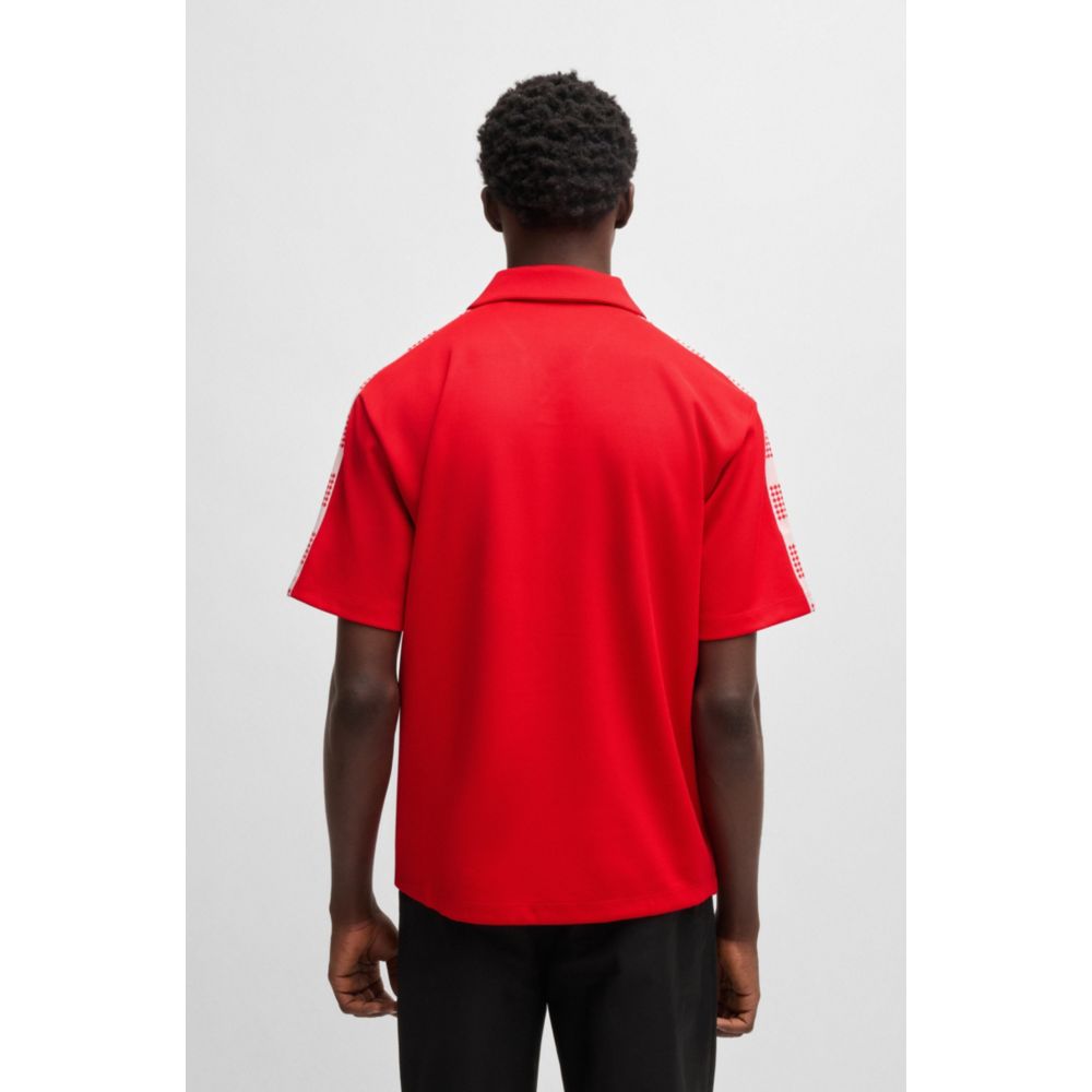 Polo shirt with checked tape