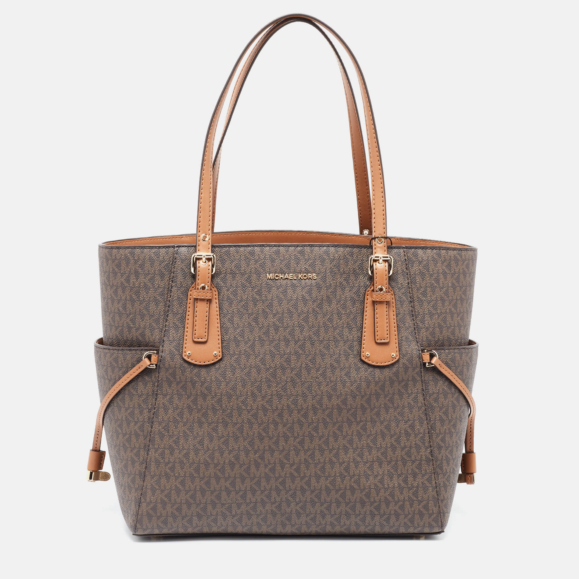 Michael Kors /tan Signature Coated Canvas And Leather Voyager Tote In Brown