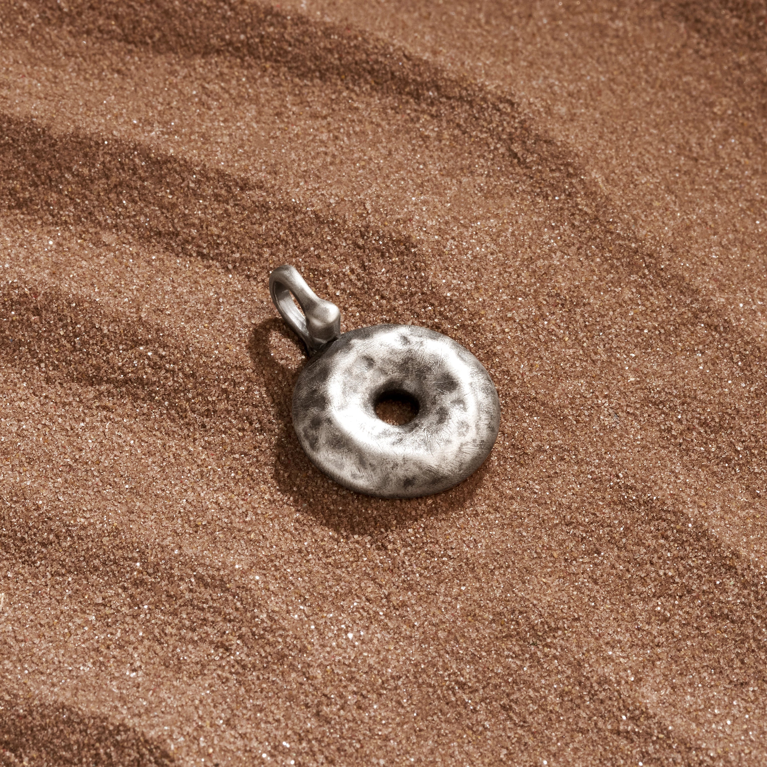 Karma And Luck Strong & Prosperous - Silver Donut Charm In Metallic