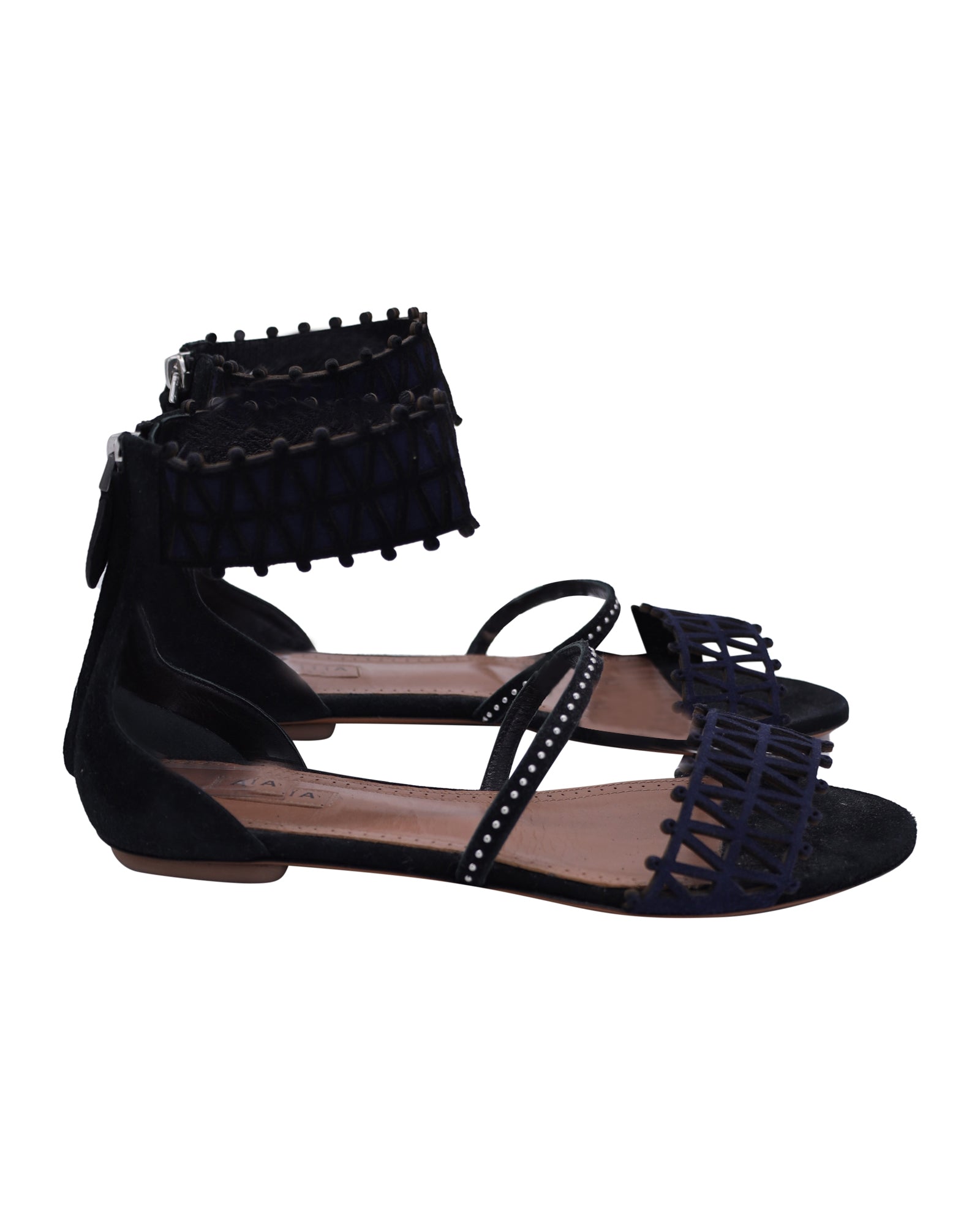 image of Alaïa Studded Laser-Cut Sandals in Black Suede